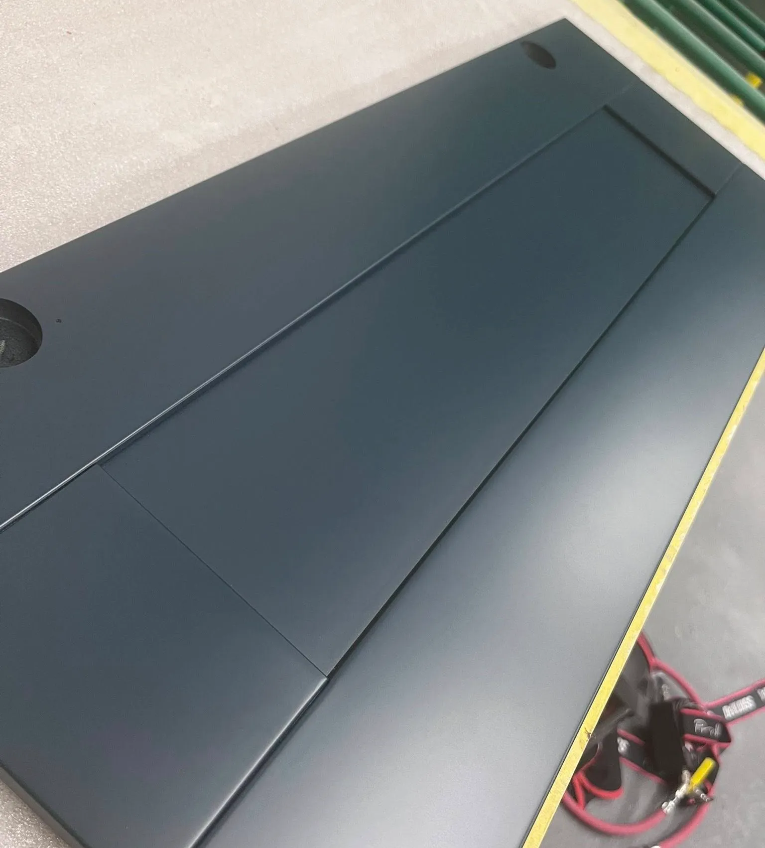 Close-up of a kitchen unit door with a smooth, factory-quality sprayed finish